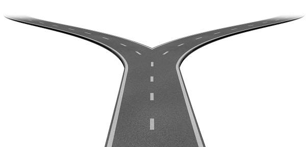 Fork in the road or highway business metaphor representing the concept of a strategic dilemma choosing the right direction to go when facing two eqaual or similar options.